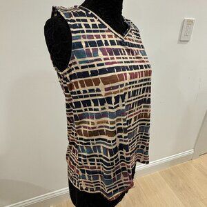 Tank top with lots of style! Soft, interesting fabric; button detail on back, M